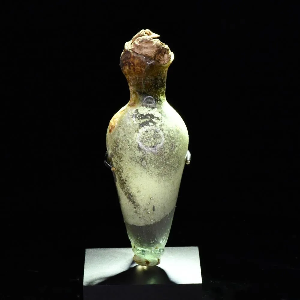 A sealed Islamic Bottle with Contents, ca 7th century CE