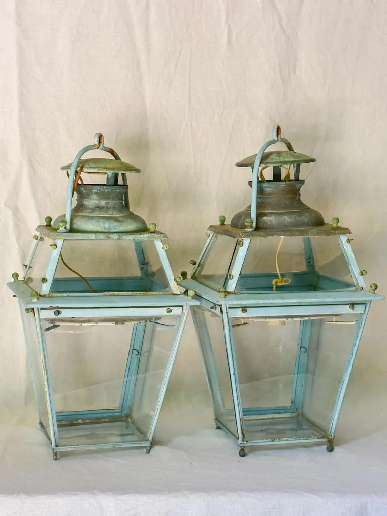 Pair of large 19th Century French lanterns with original glass and blue patina