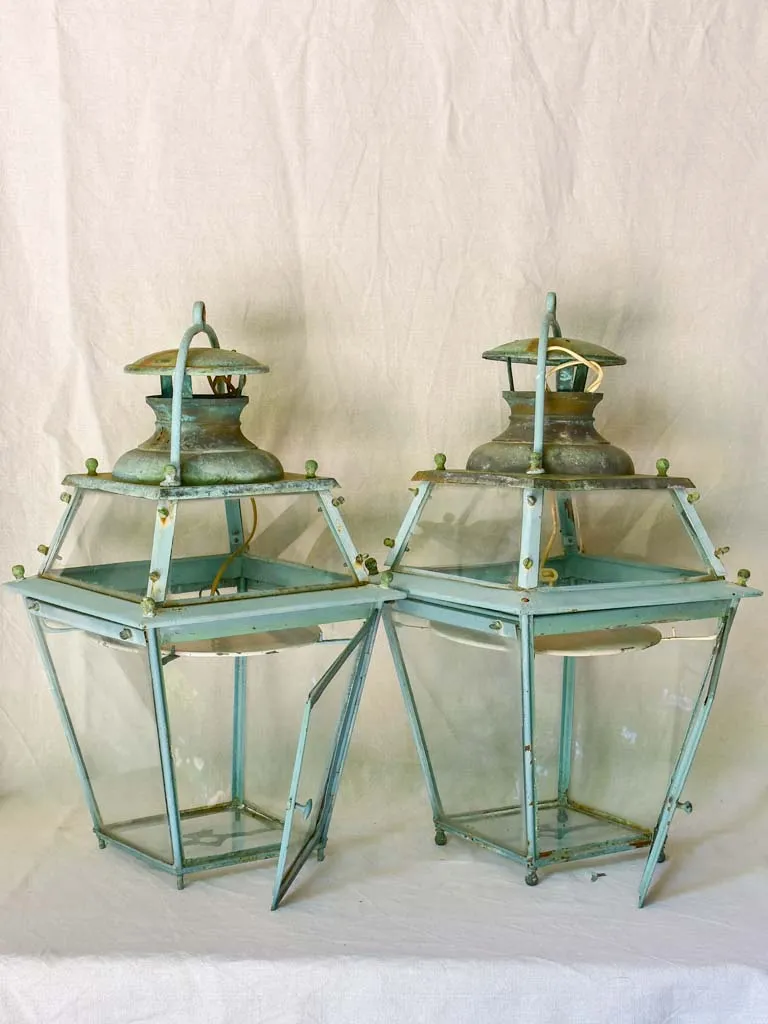 Pair of large 19th Century French lanterns with original glass and blue patina