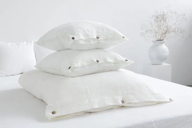 White linen bedding set with coconut buttons