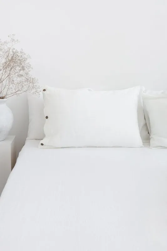 White linen bedding set with coconut buttons